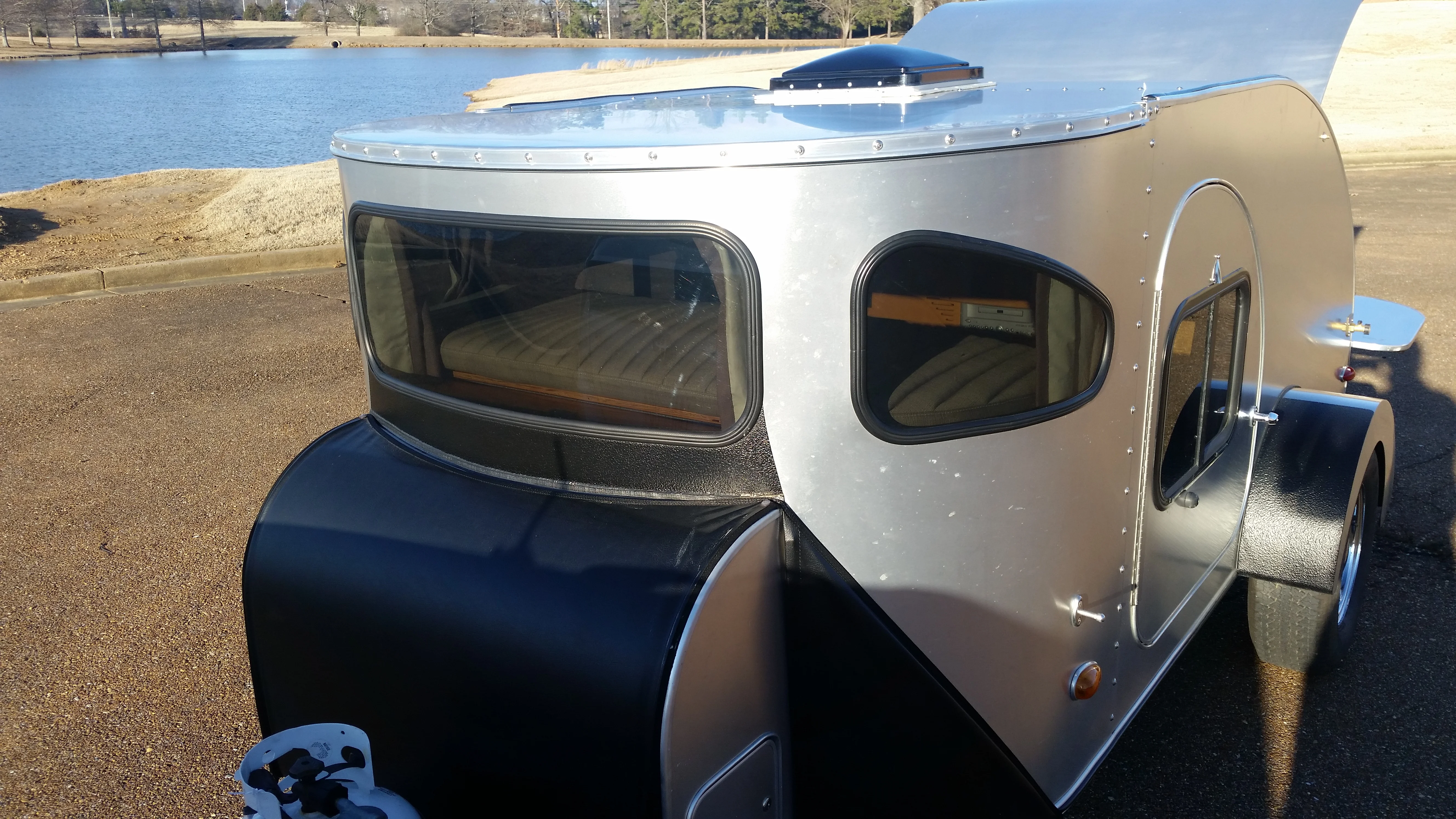 2005 Camp-Inn 560 Ultra, Left Front Quarter Outside View.webp